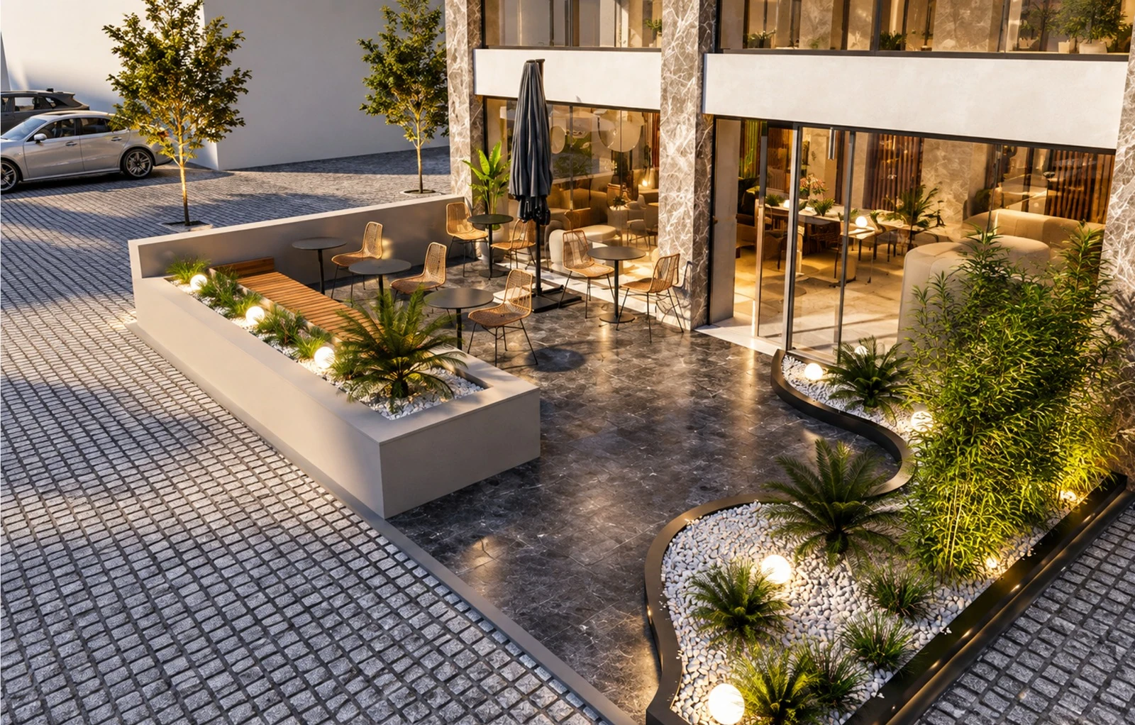 An overhead view of the entrance terrace with seating and curved planting beds